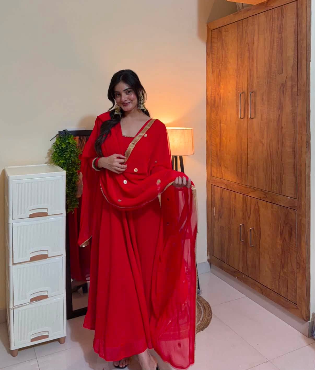Ruby Red Georgette Saree with Gold Border & Embellished Blouse
