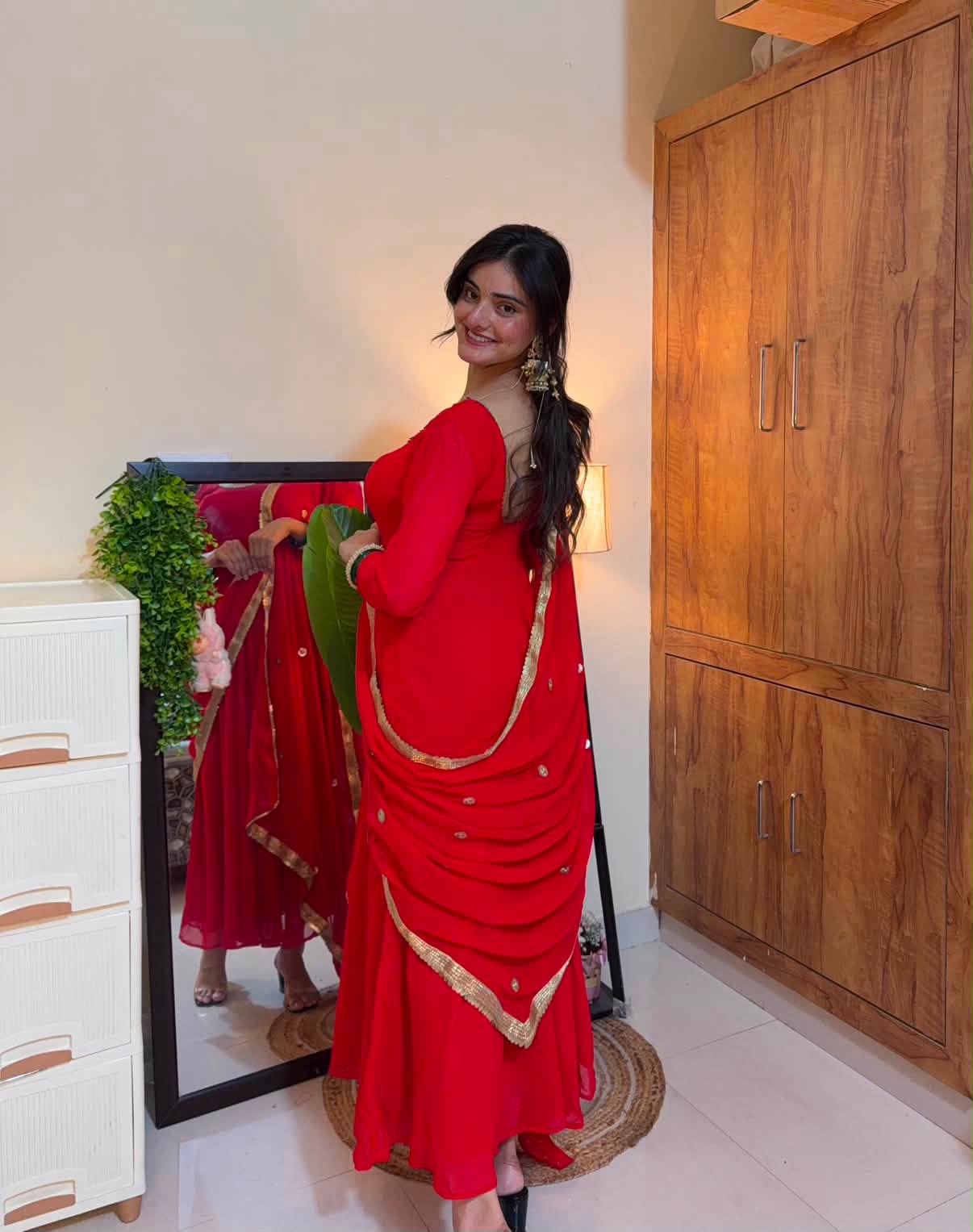 Ruby Red Georgette Saree with Gold Border & Embellished Blouse